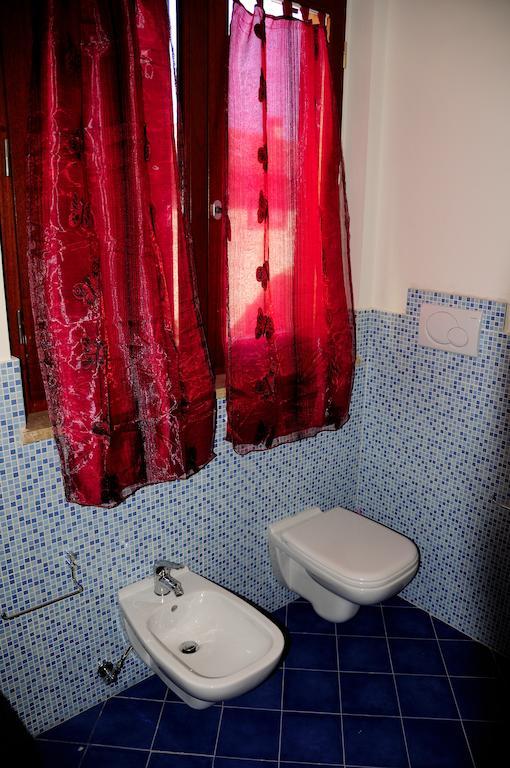 I Portici Appartamenti מרינה די גרוסטו חדר תמונה